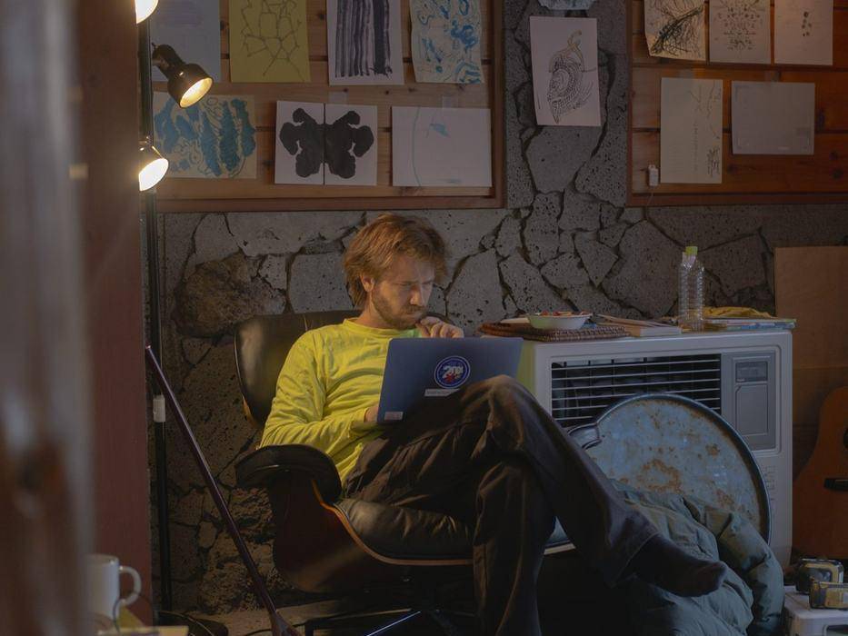 Working at a desk in a cabin room